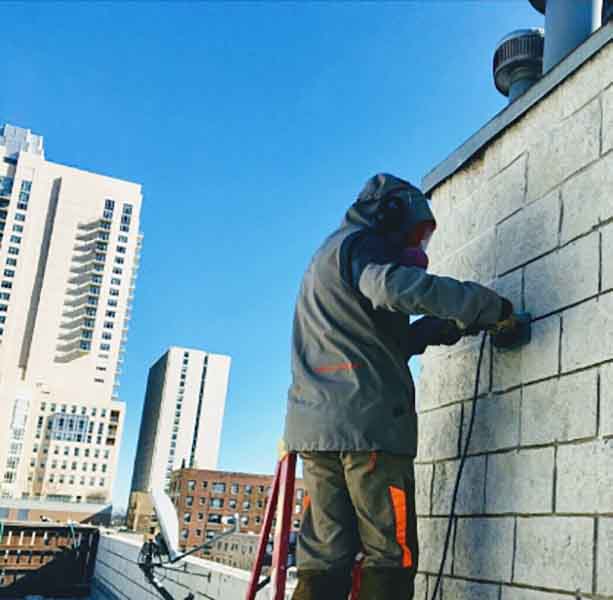 working repairing concrete block wall - Gralak Masonry Contractors - Chicago