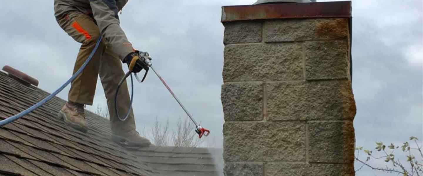 Gralak worker repairing chimney