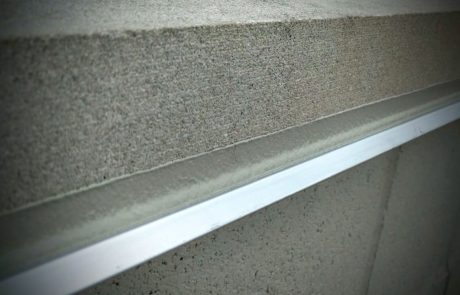Flashing System Under Parapet Wall